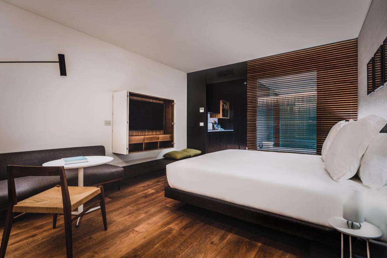 Sls Buenos Aires Puerto Madero Hotel Kültér fotó A room at the hotel